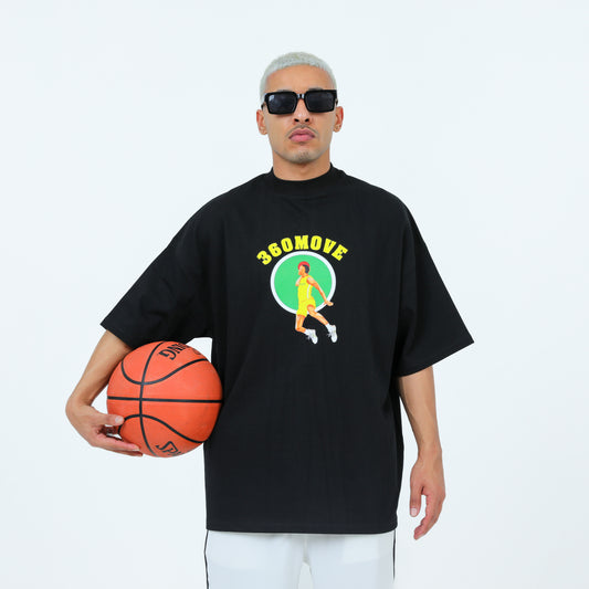 Person in a black oversized t-shirt with a basketball graphic and text, holding a basketball.